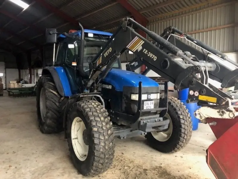 New Holland TM 115 (301)